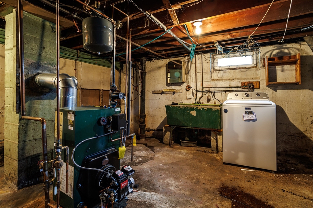 49 Bennett Street Chicopee, MA 01013 - Photo 30 of 42 a utility room with washer and dryer