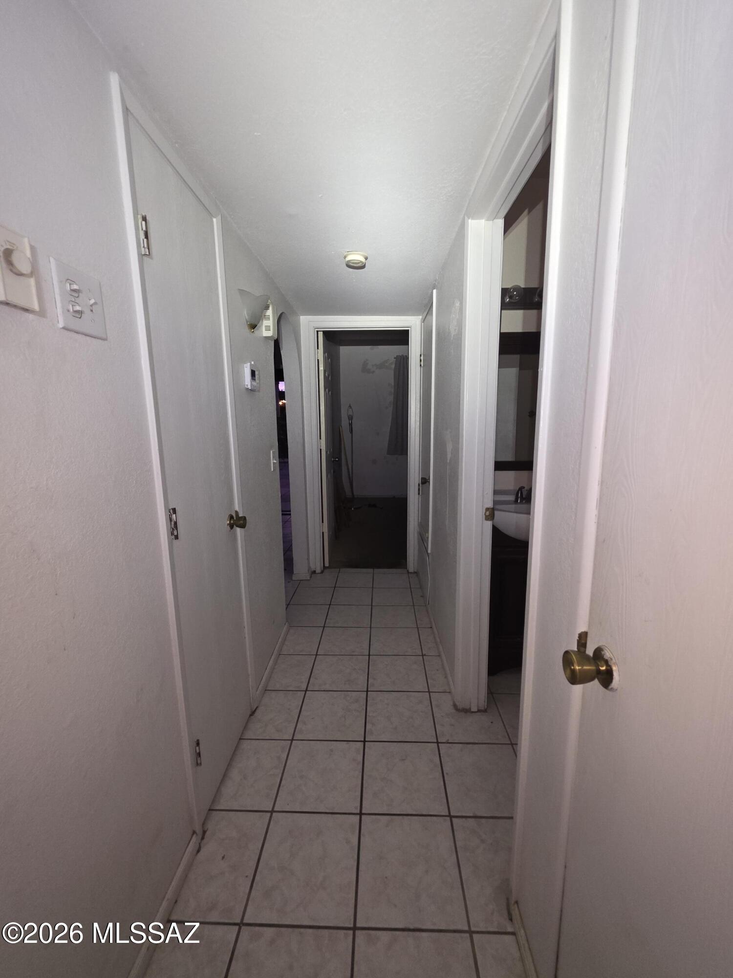 211 West Roger Road, Unit 24 Tucson, AZ 85705 - Photo 9 of 24 a view of a hallway