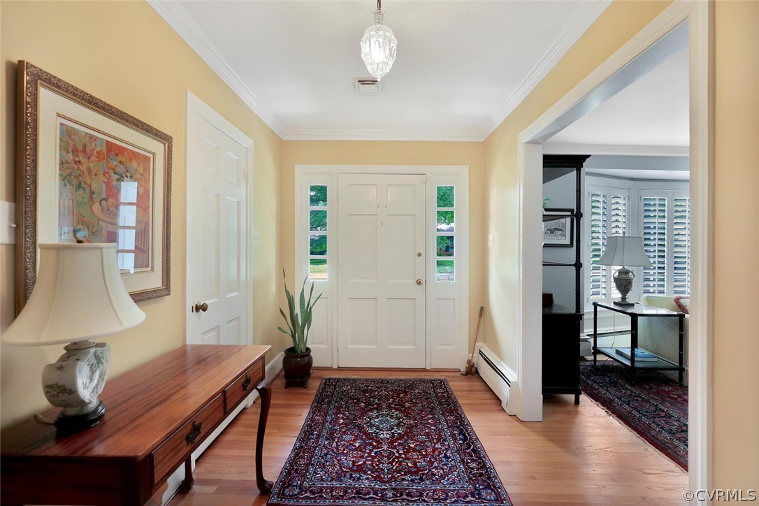 8805 Sierra Road Henrico, VA 23229 - Photo 7 of 36 The entryway is bright and wide. The beautiful tr