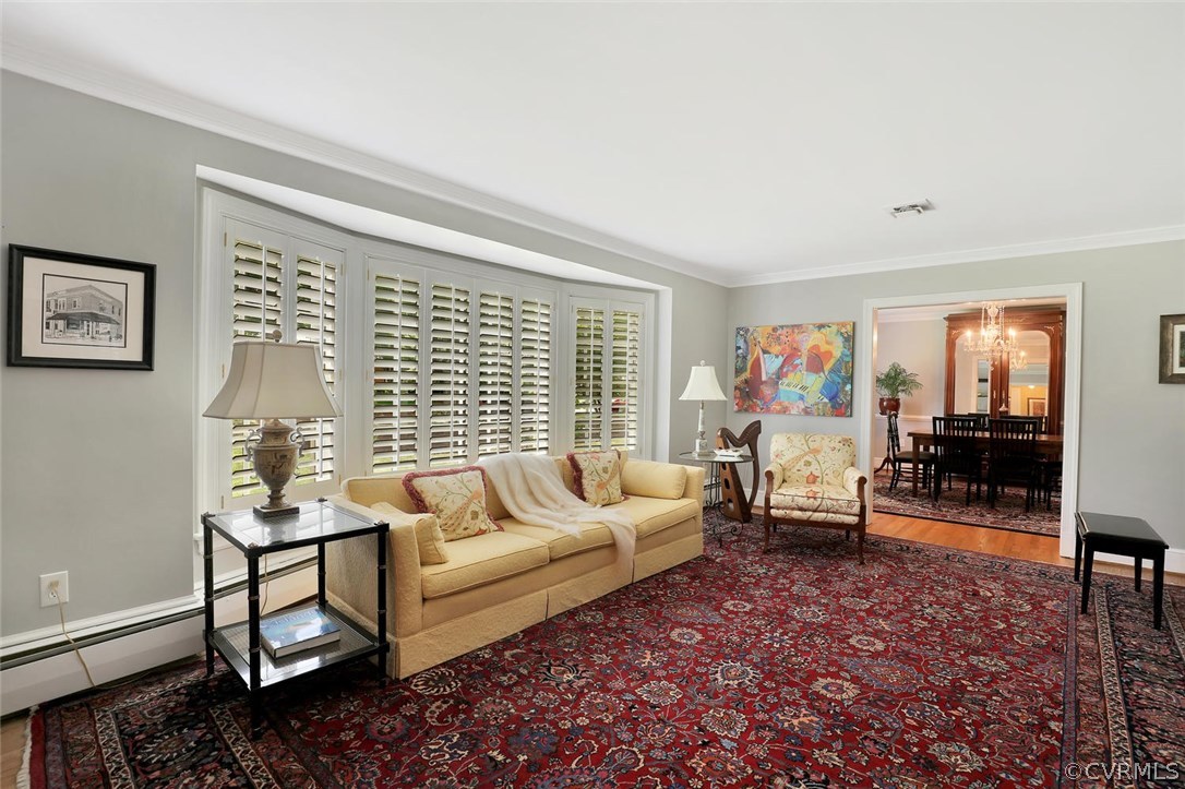 8805 Sierra Road Henrico, VA 23229 - Photo 8 of 36 The formal living room includes a lovely bay windo