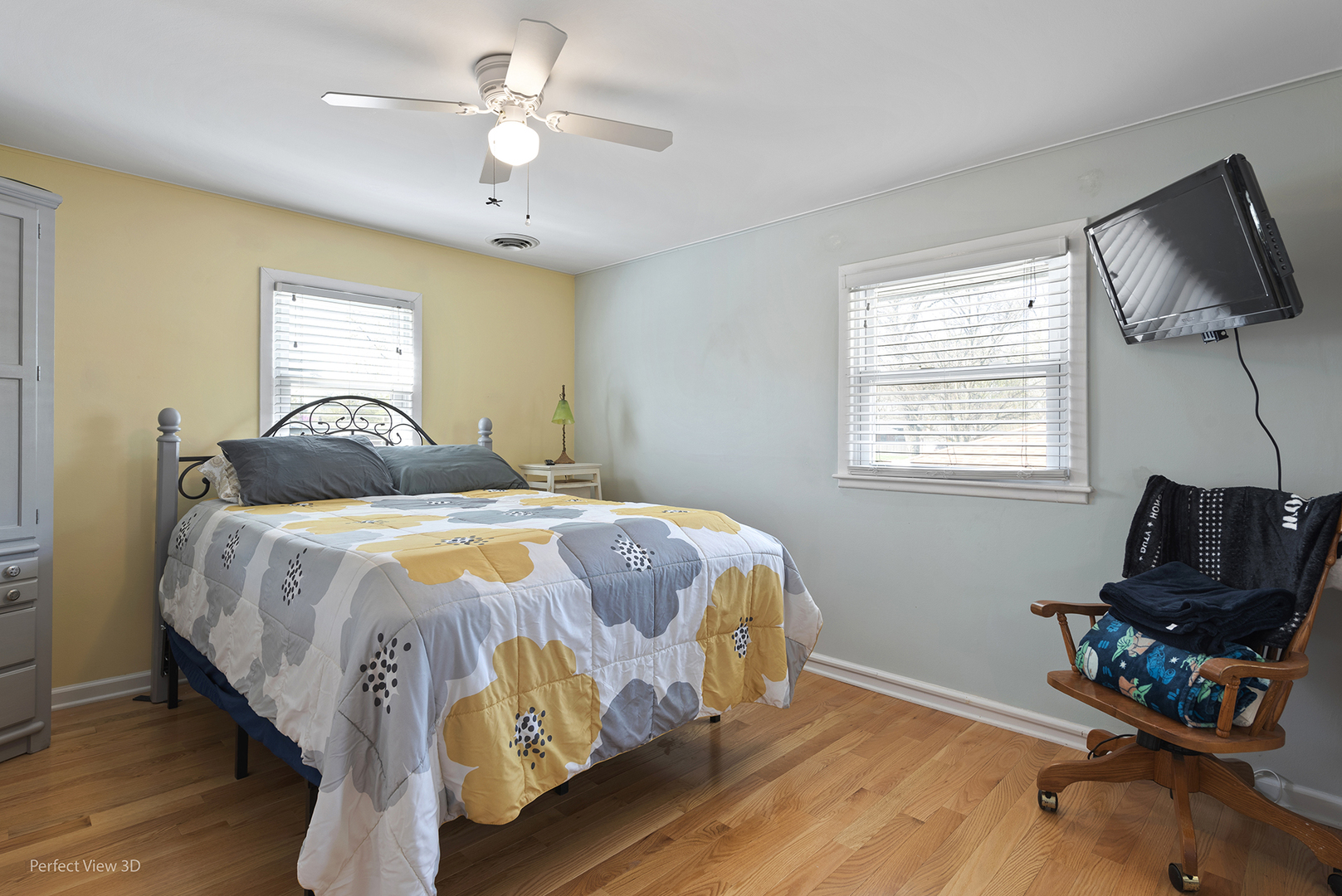 1422 Hillview Road Homewood, IL 60430 - Photo 17 of 34 a bedroom with a bed and a flat screen tv