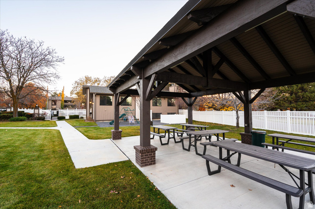 888 East 6895 South Midvale, UT 84047 - Photo 24 of 54 Covered picnic area with multiple seating spaces, perfect for outdoor gatherings, dining, and neighborhood events.