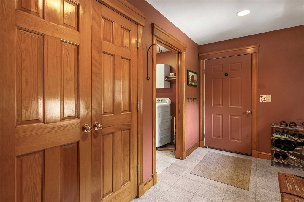 24 Manchaug Road Sutton, MA 01590 - Photo 22 of 40 a view of a hallway with closet area
