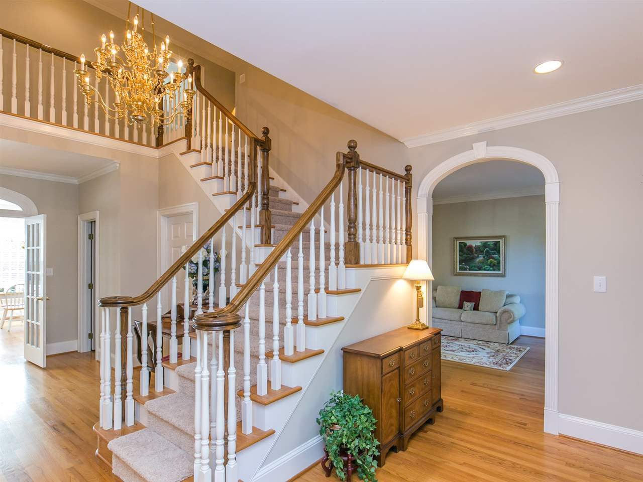 1604 Adams Mountain Road Raleigh, NC 27614 - Photo 3 of 25 View of stairs from the foyer. Notice the lovely arched doorway to the living room. Foyer