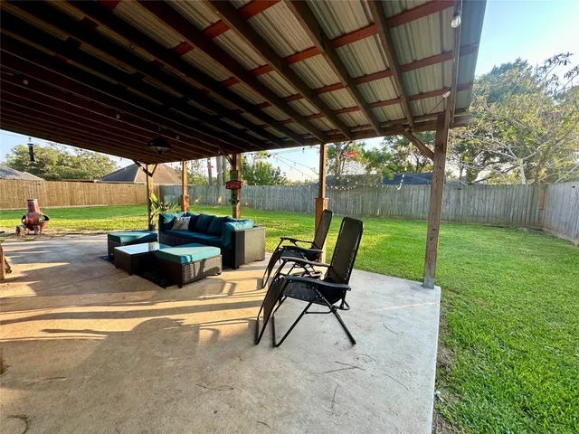 a view of a swimming pool with a patio