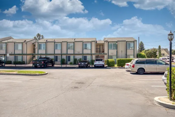 a view of a street with cars