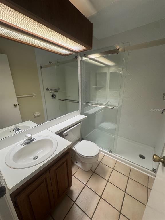40 Austin Place Oldsmar, FL 34677 - Photo 9 of 26 a bathroom with a sink toilet and shower