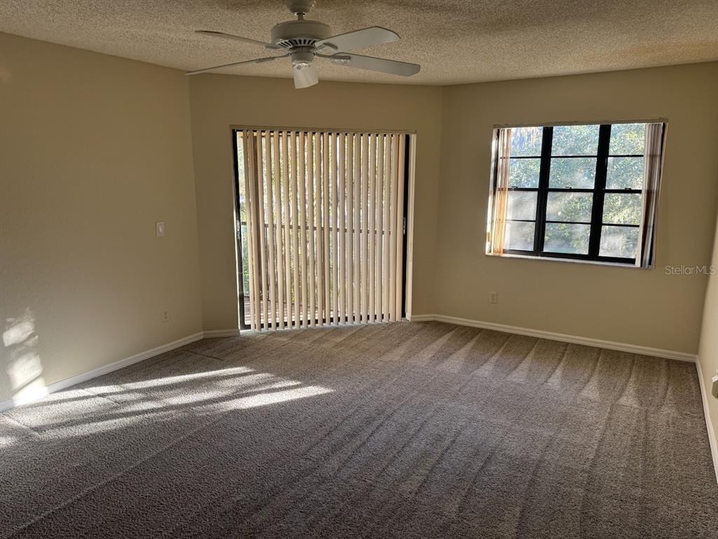 40 Austin Place Oldsmar, FL 34677 - Photo 10 of 26 a view of an empty room with a window
