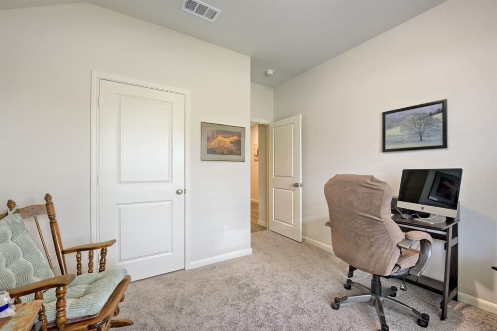 420 Jameson Springtown, TX 76082 - Photo 20 of 29 a view of a workspace with furniture and a window