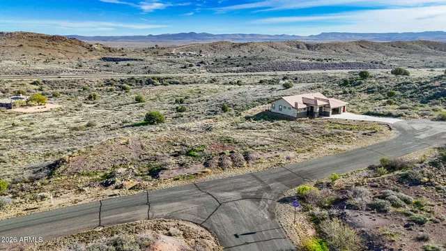 a view of a beach with a mountain