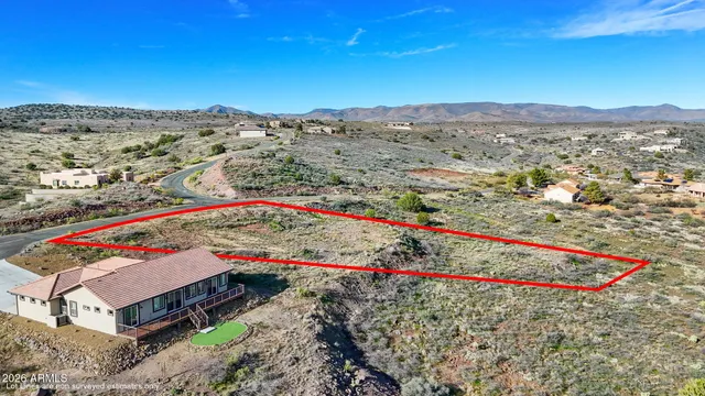 a view of a houses with a mountain