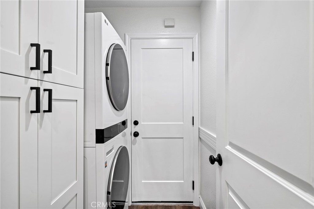 13615 Almond Street Tustin, CA 92782 - Photo 15 of 54 a utility room with dryer and washer