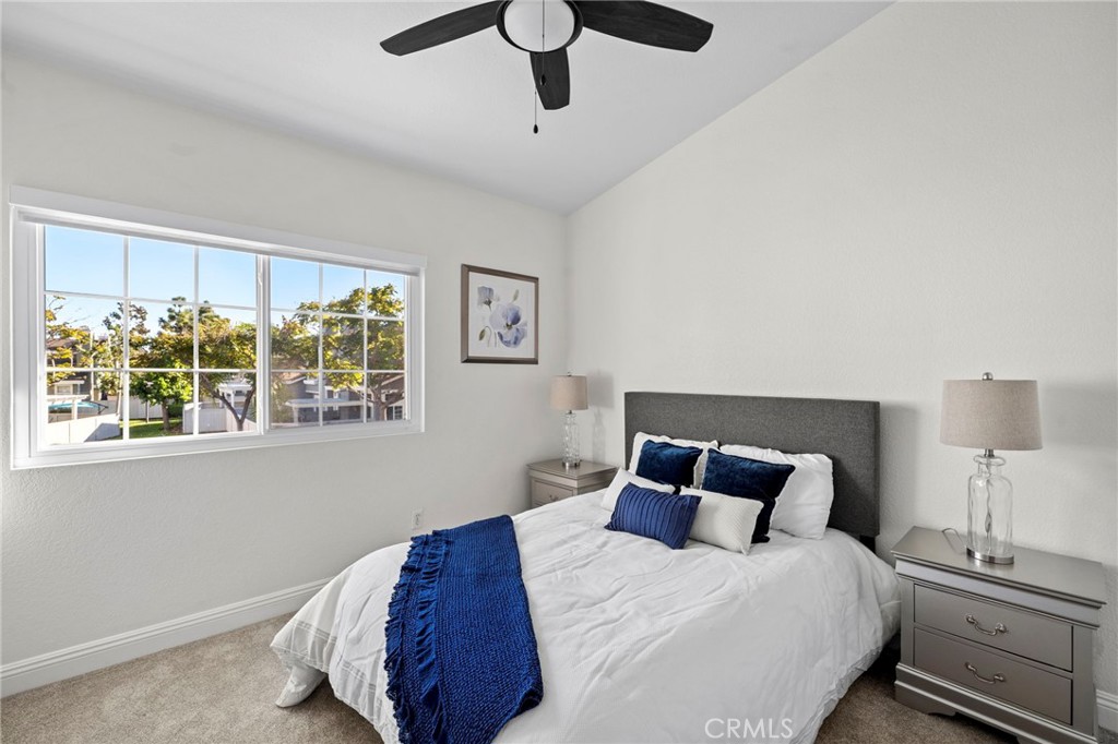 13615 Almond Street Tustin, CA 92782 - Photo 16 of 54 a bedroom with a bed and window