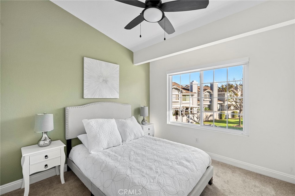 13615 Almond Street Tustin, CA 92782 - Photo 18 of 54 a bedroom with a bed and a window