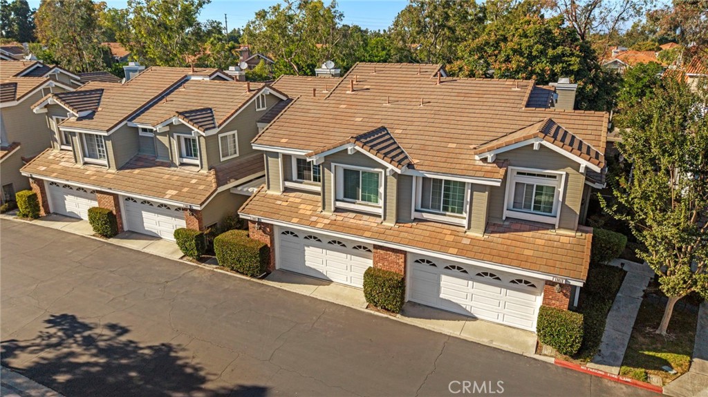 13615 Almond Street Tustin, CA 92782 - Photo 29 of 54 a aerial view of a house with a yard