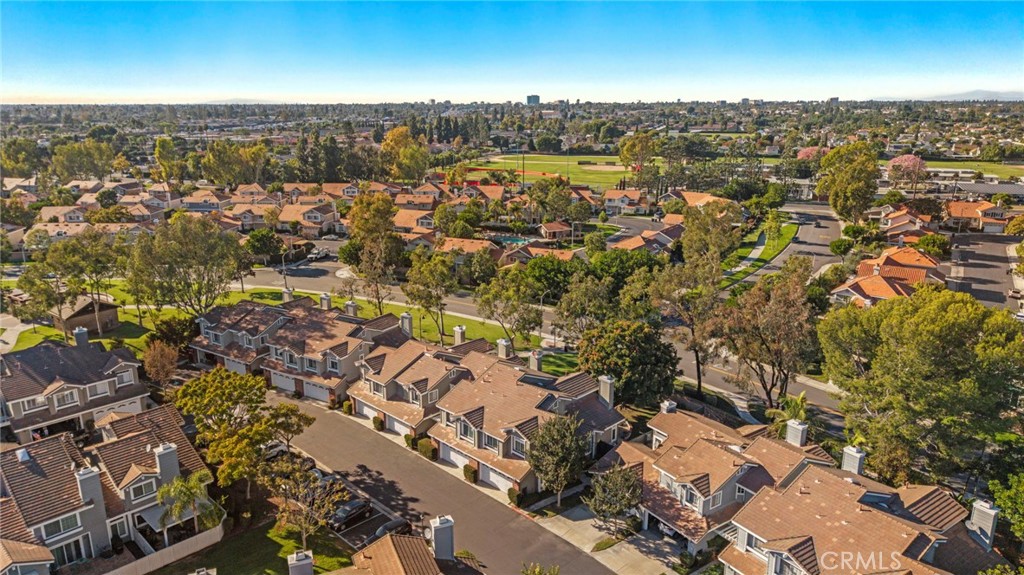 13615 Almond Street Tustin, CA 92782 - Photo 34 of 54 an aerial view of residential building with parking space