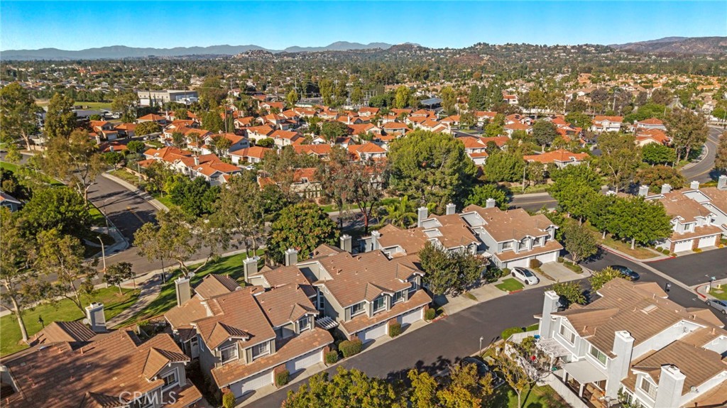 13615 Almond Street Tustin, CA 92782 - Photo 36 of 54 an aerial view of residential houses with outdoor space and trees