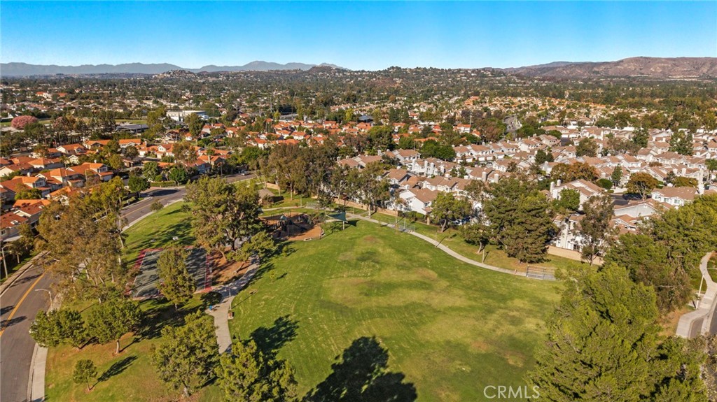 13615 Almond Street Tustin, CA 92782 - Photo 41 of 54 a view of residential houses with city and mountain view