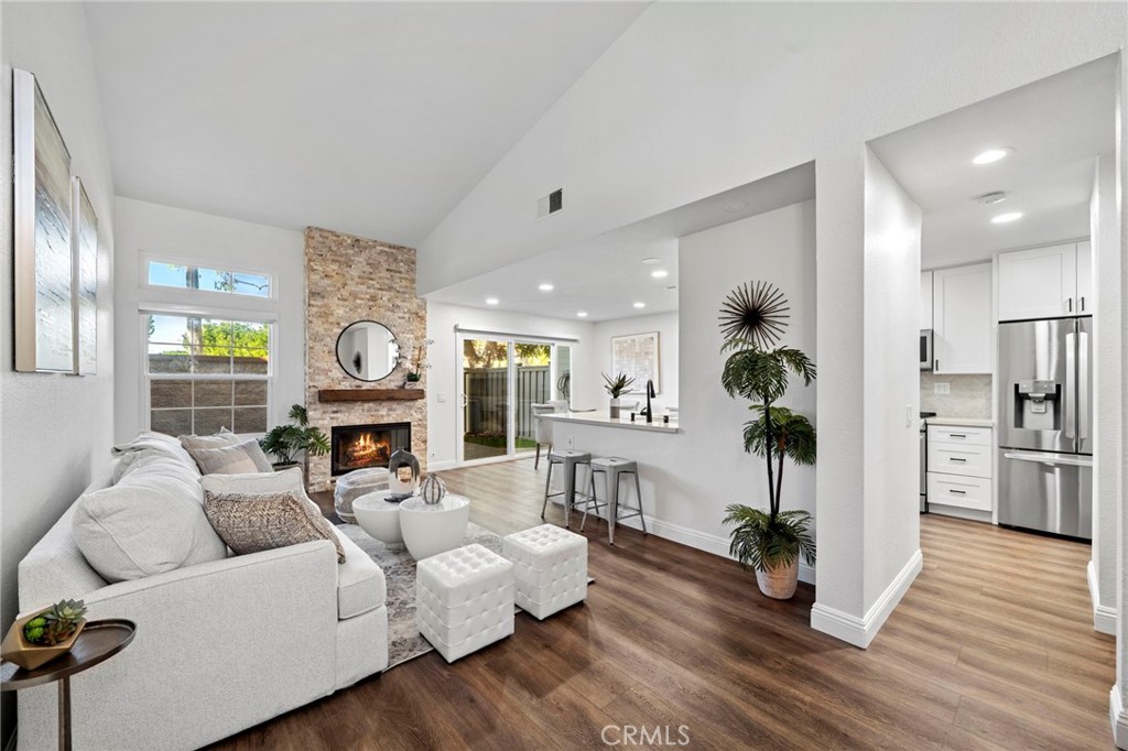 13615 Almond Street Tustin, CA 92782 - Photo 5 of 54 a living room with furniture and a wooden floor