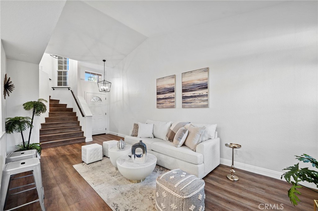 13615 Almond Street Tustin, CA 92782 - Photo 7 of 54 a living room with furniture and wooden floor