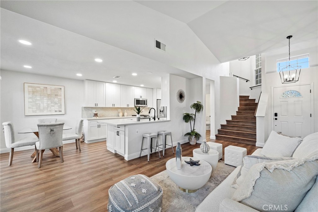 13615 Almond Street Tustin, CA 92782 - Photo 8 of 54 a living room with furniture and wooden floor