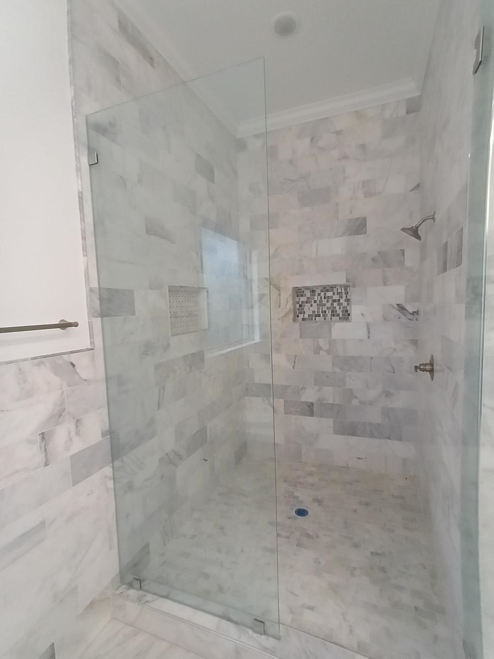 5690 Walnut Grove Road Memphis, TN 38120 - Photo 33 of 40 a bathroom with a shower