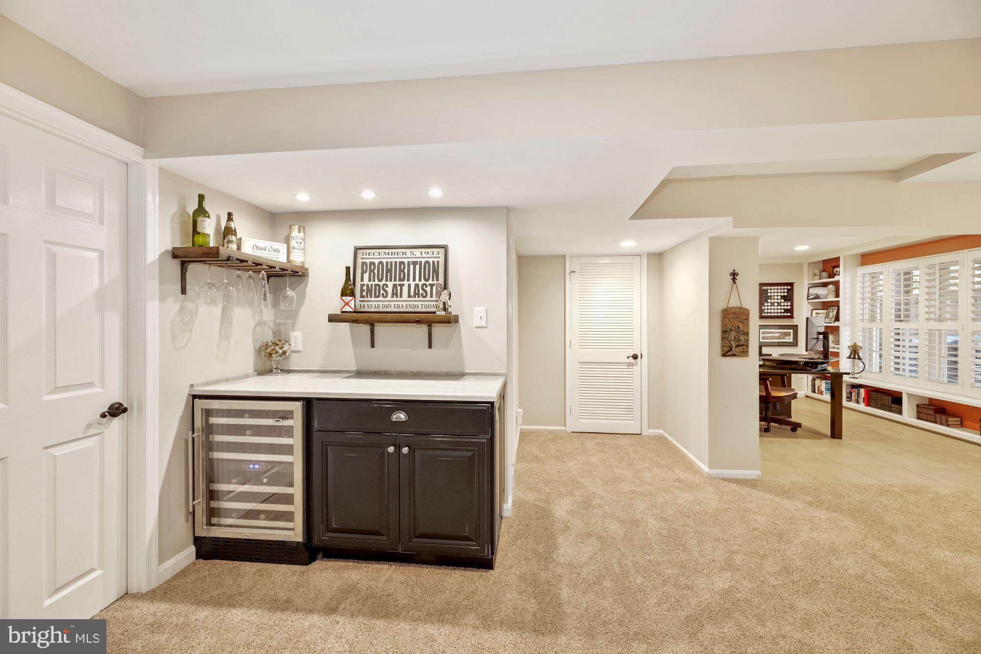 11408 Hollow Timber Way Reston, VA 20194 - Photo 37 of 71 Bar area w/ wine Cooler