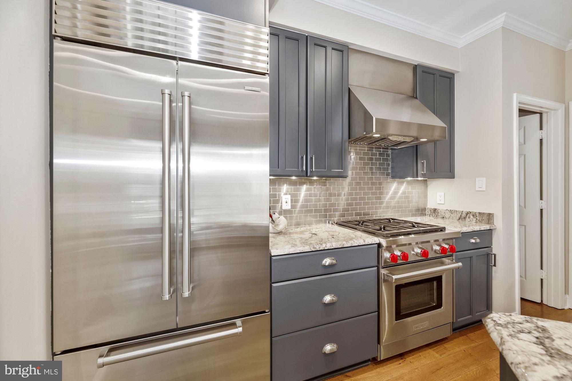 11408 Hollow Timber Way Reston, VA 20194 - Photo 8 of 71 Wolf Gas Range & Sub-Zero Refridgerator