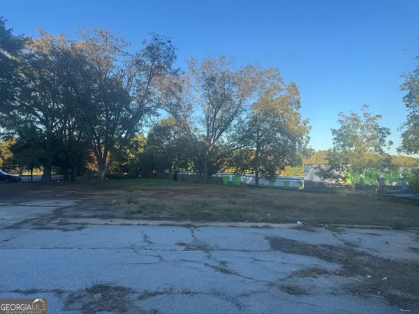 a backyard of a house with trees