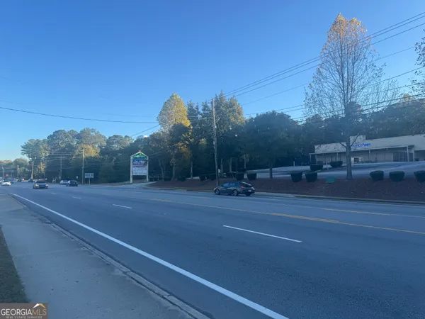a view of road with trees