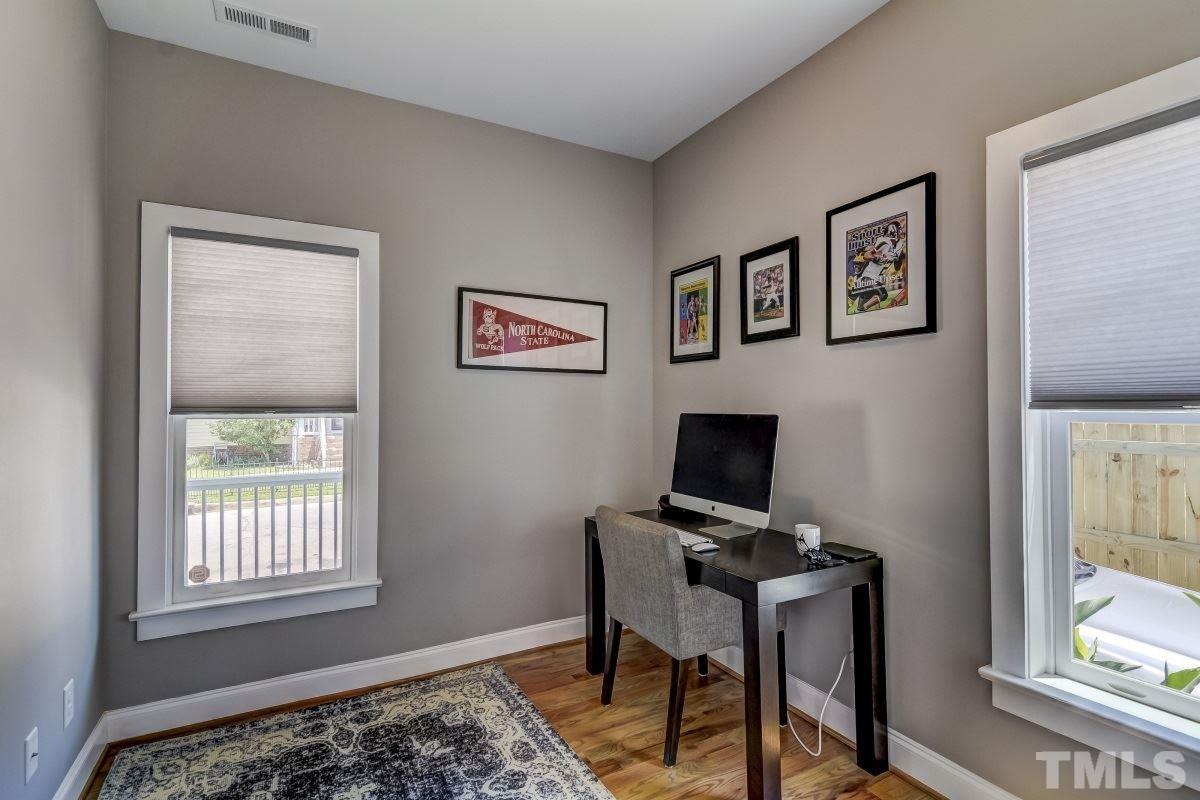 520 Alston Street Raleigh, NC 27601 - Photo 9 of 15 a view of a workspace with furniture and a window