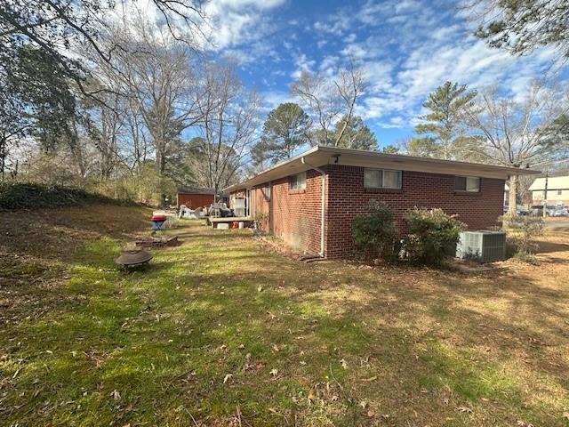 175 Ridgecrest Drive Northwest Calhoun, GA 30701 - Photo 4 of 17 a backyard of a house with table and chairs