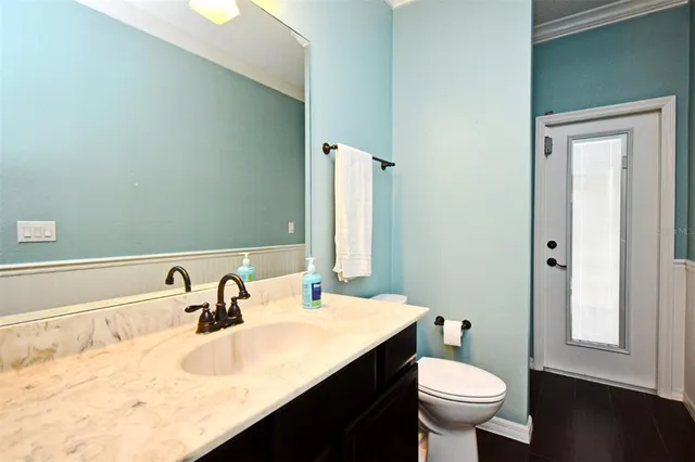 a bathroom with a sink and a toilet