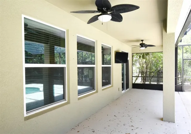 a view of a room with a large window