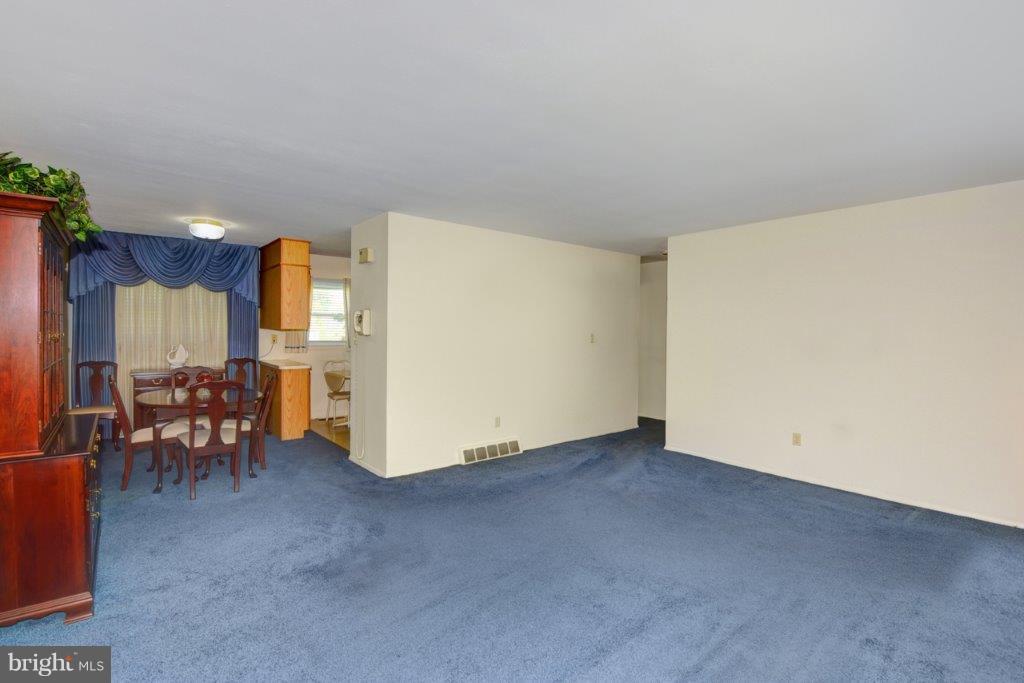 15 Rene Carr Street Elkton, MD 21921 - Photo 5 of 19 Entertainment Area Opens to Dining Area