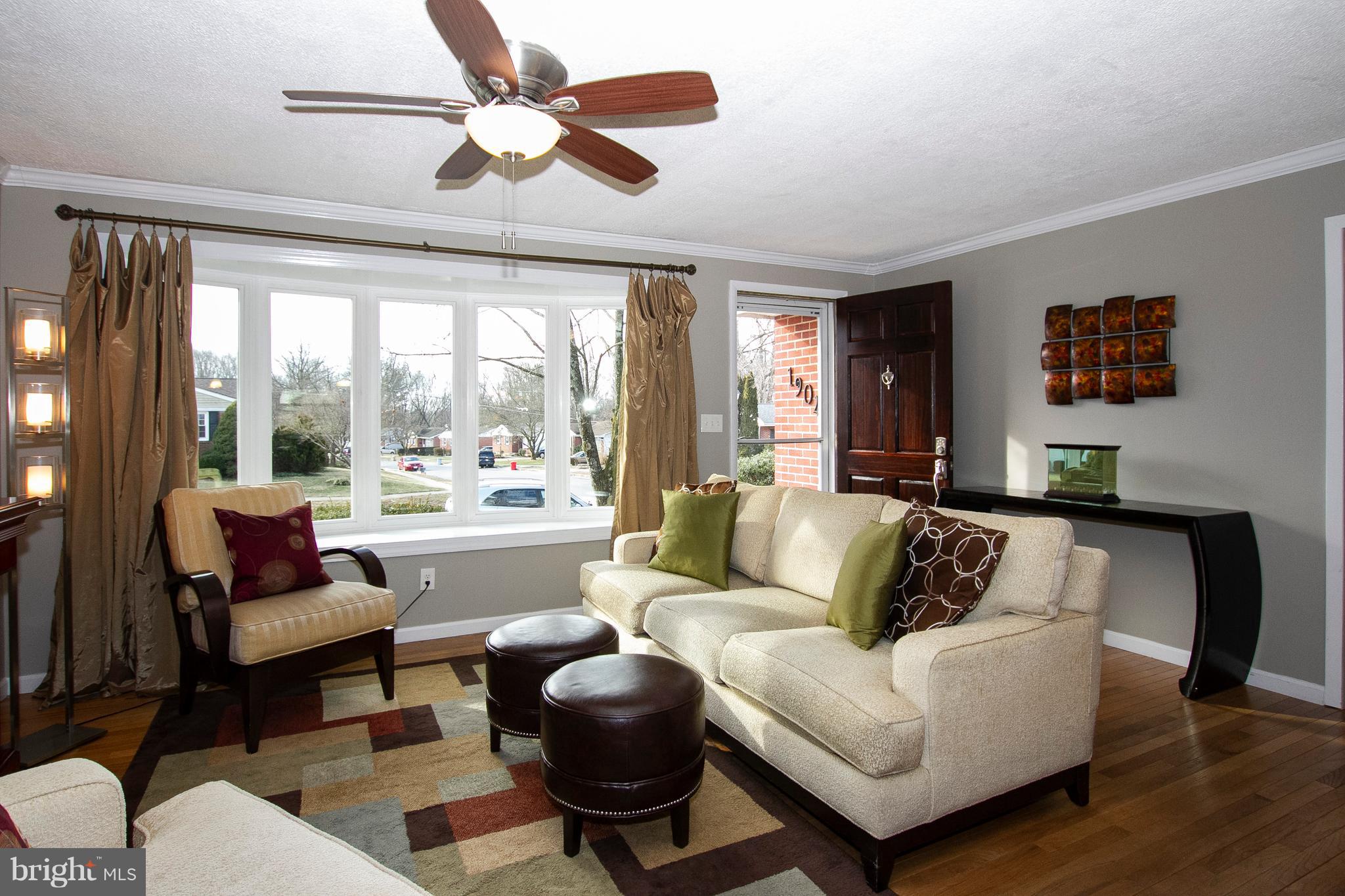 1904 Logwind Road Catonsville, MD 21228 - Photo 3 of 34 a living room with furniture and a large window