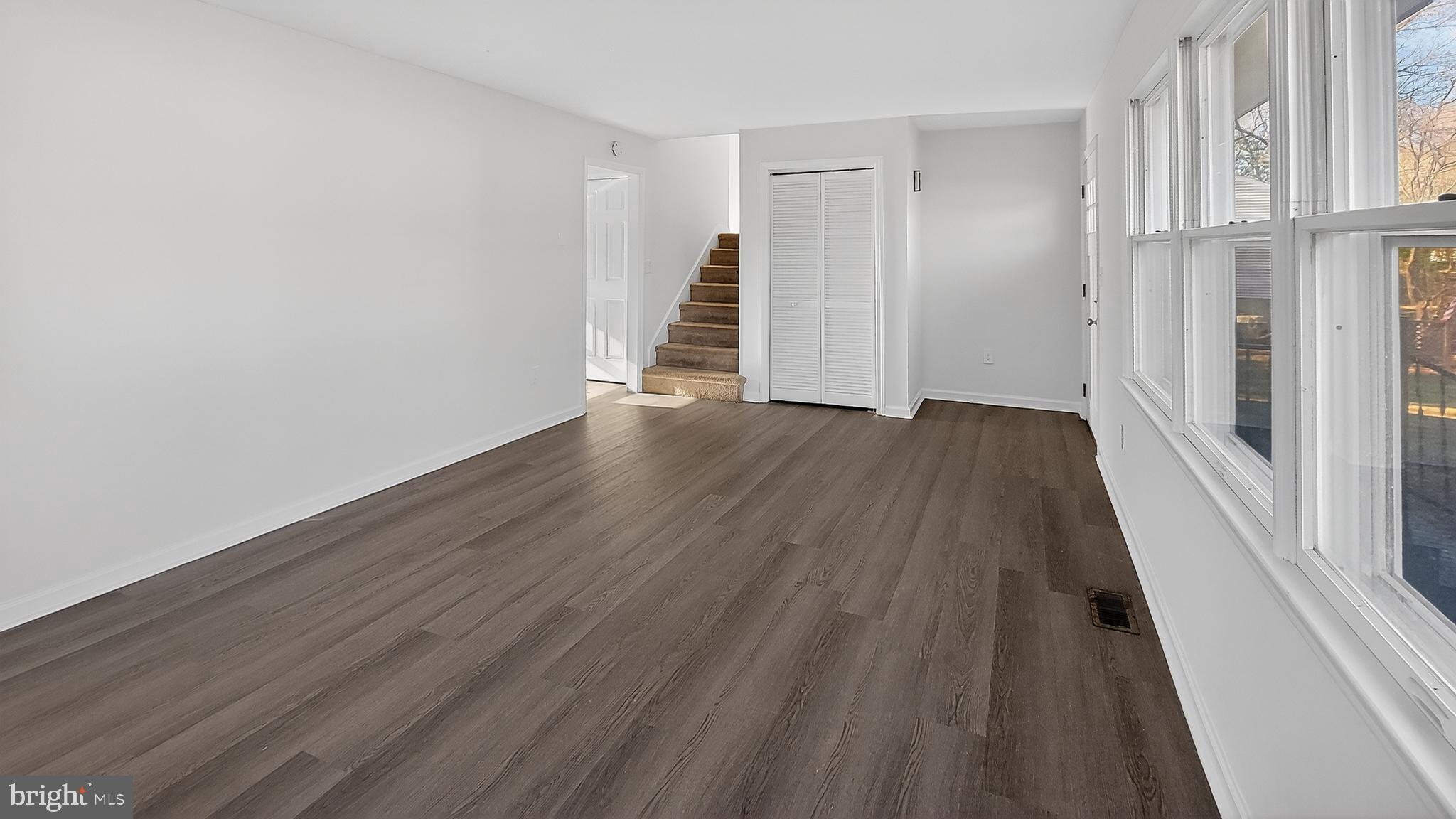 232 Morris Drive Salisbury, MD 21804 - Photo 7 of 36 a view of a room with wooden floor and entryway