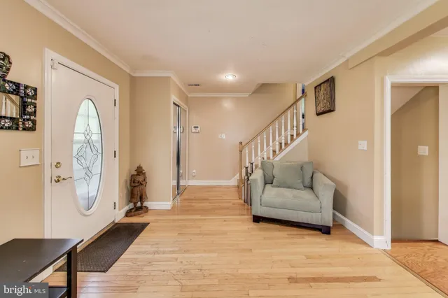 a kitchen with granite countertop a stove sink and cabinets