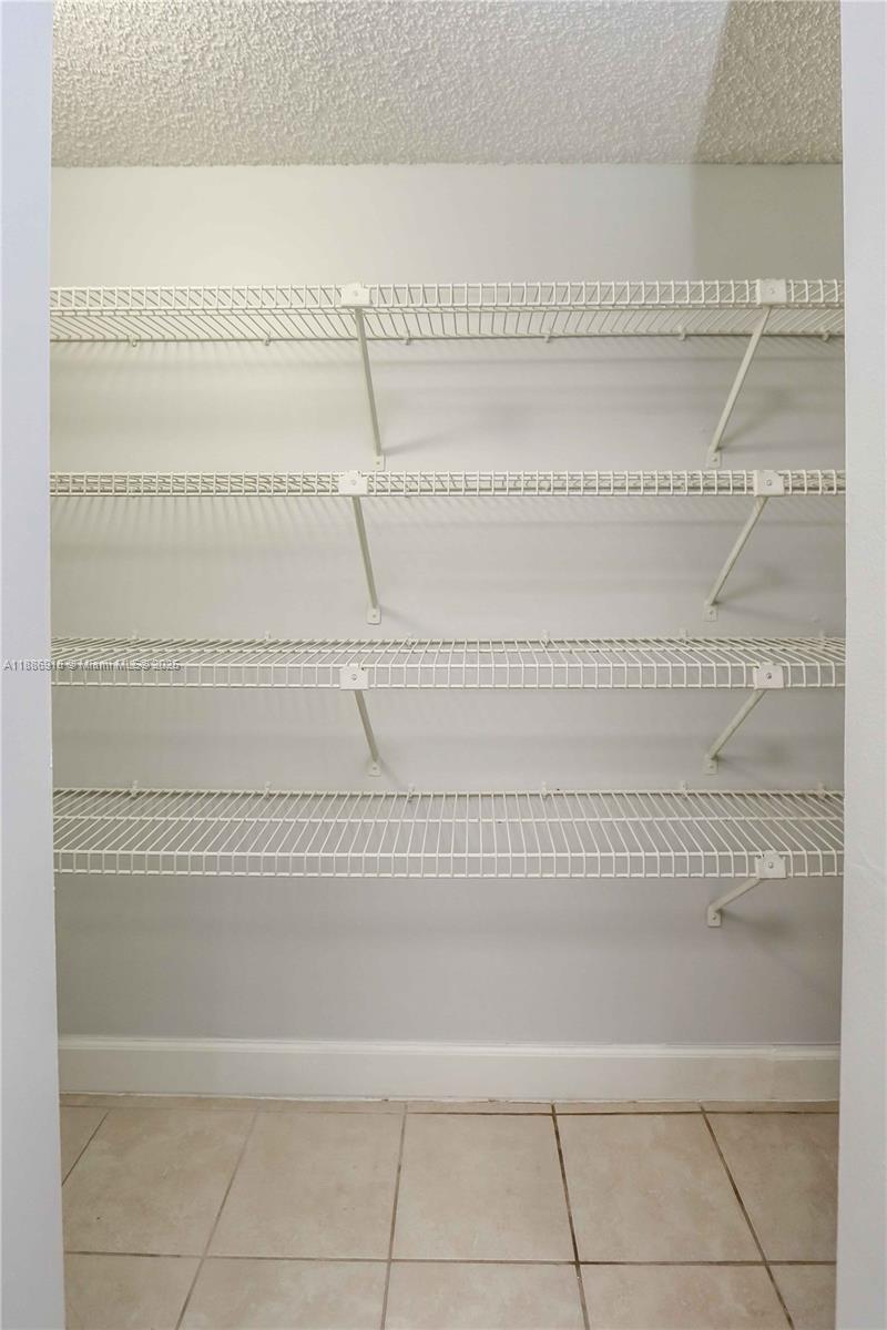 850 North Miami Avenue, Unit W305 Miami, FL 33136 - Photo 17 of 27 a bathroom with a bathtub