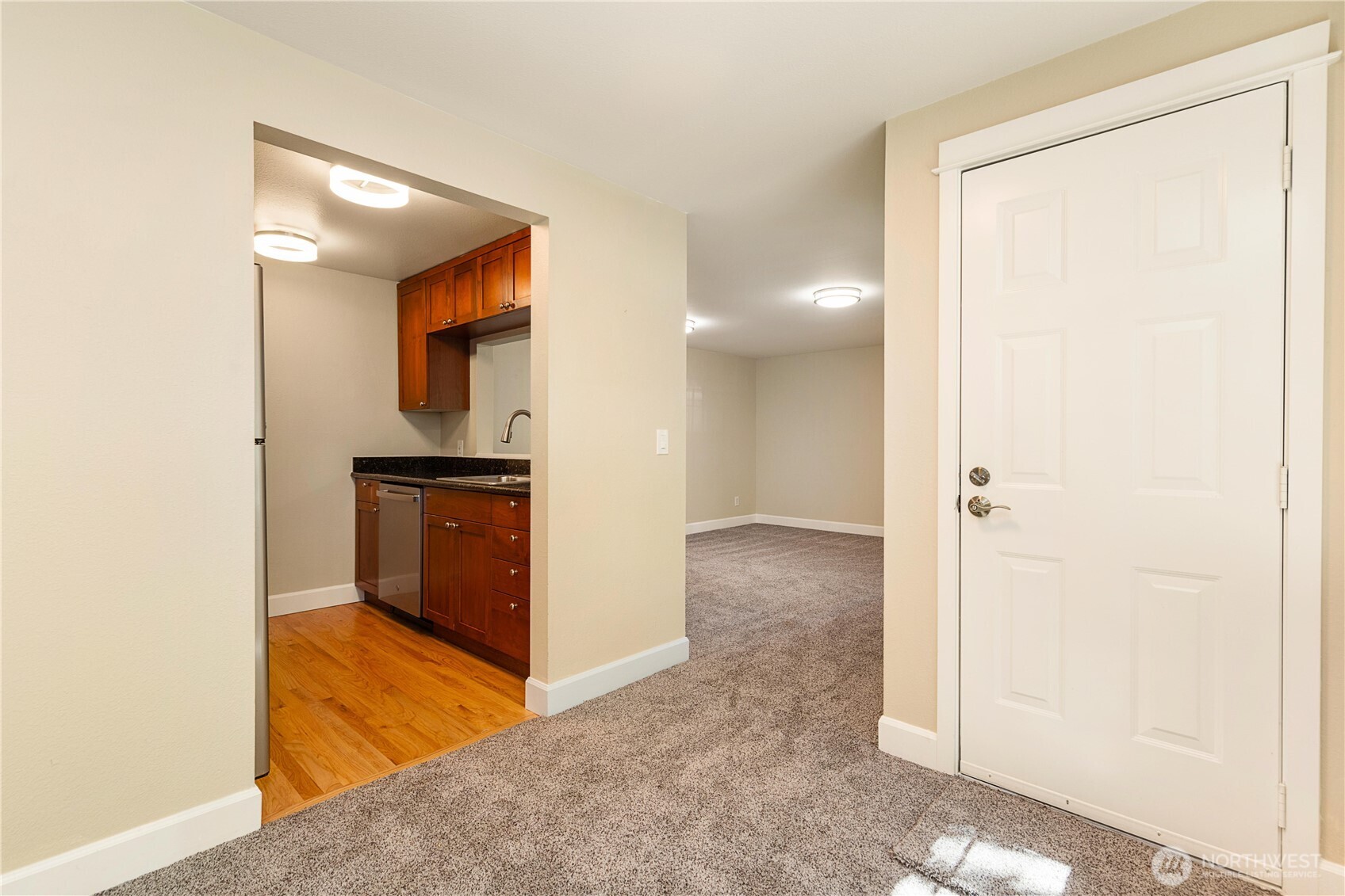 755 5th Avenue Northwest, Unit D202 Issaquah, WA 98027 - Photo 10 of 25 a view of a hallway with wooden floor