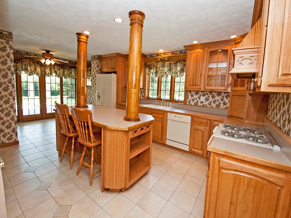 119 Fir Street Rillton, PA 15678 - Photo 10 of 16 Large working kitchen with an eat-in breakfast bar