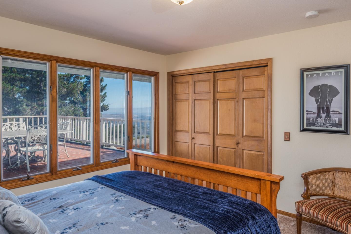 12765 Sundance Lane Carmel Valley, CA 93924 - Photo 18 of 43 a view of a bedroom with furniture and wooden floor