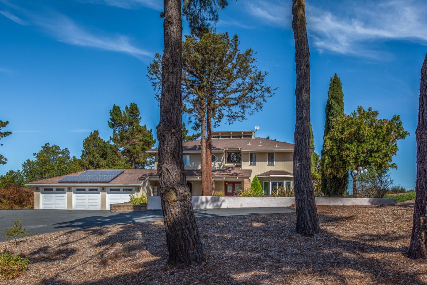12765 Sundance Lane Carmel Valley, CA 93924 - Photo 2 of 43 a view of a house with a yard