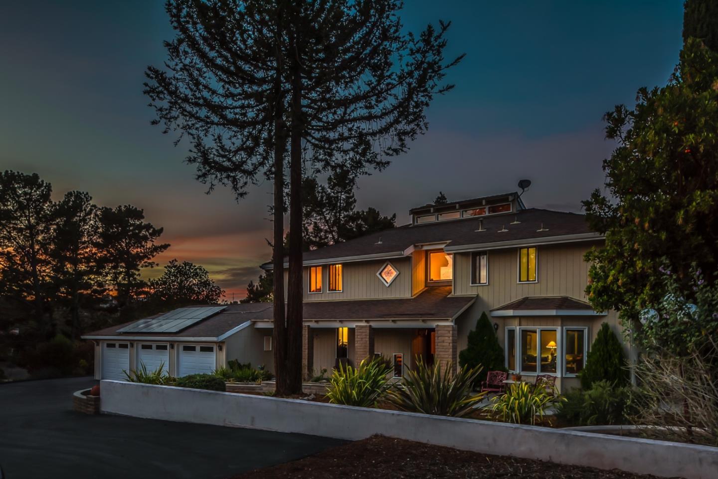 12765 Sundance Lane Carmel Valley, CA 93924 - Photo 4 of 43 a front view of a house with garden