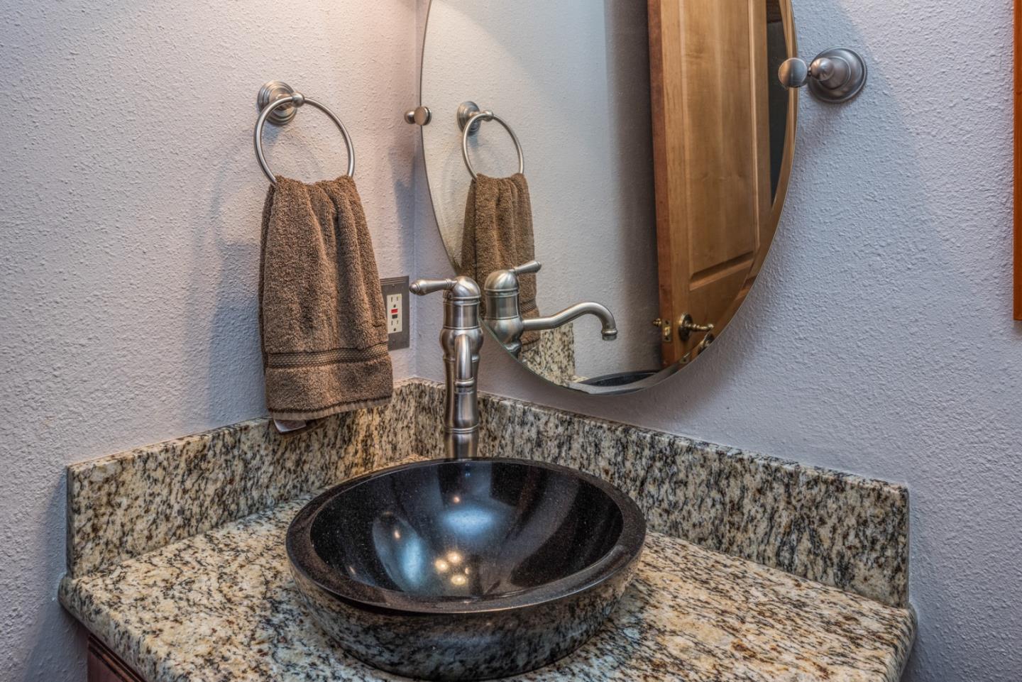 12765 Sundance Lane Carmel Valley, CA 93924 - Photo 8 of 43 a bathroom with a sink and a mirror