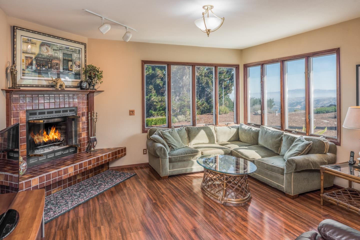 12765 Sundance Lane Carmel Valley, CA 93924 - Photo 9 of 43 a living room with furniture and a fireplace