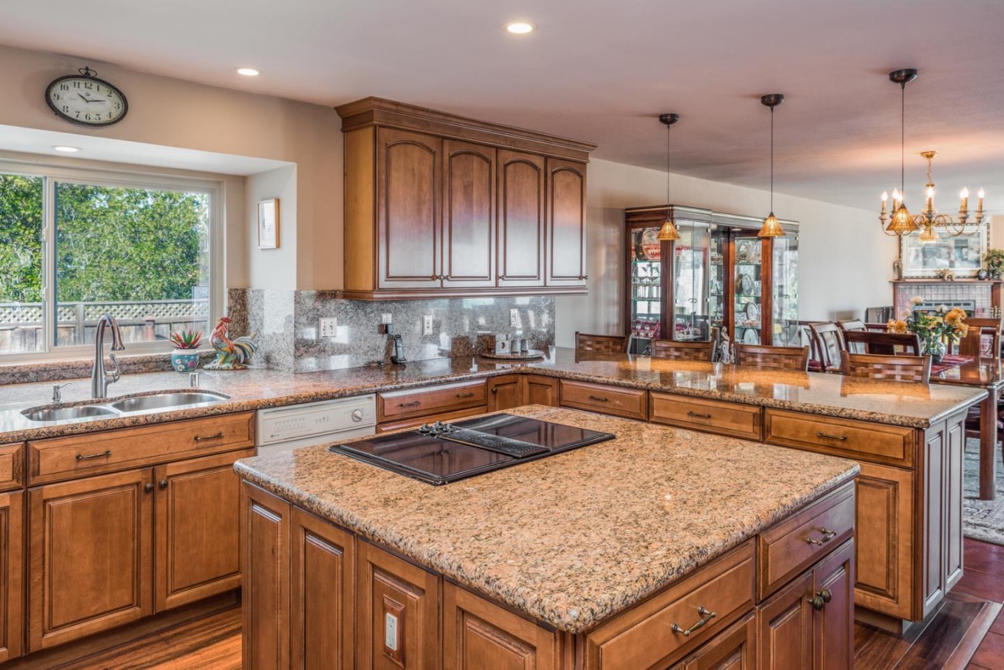 12765 Sundance Lane Carmel Valley, CA 93924 - Photo 10 of 43 a kitchen with a sink a counter space and a window