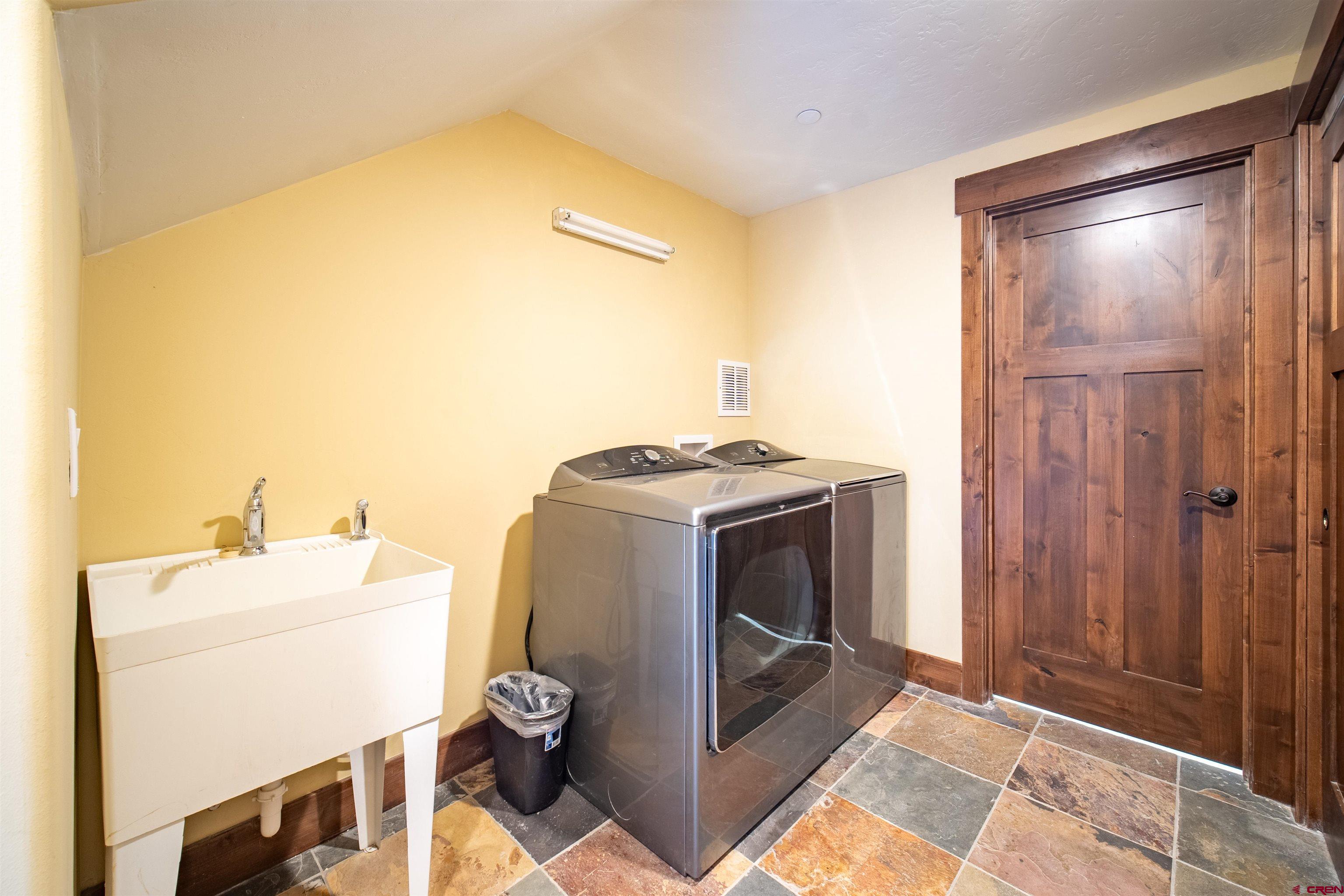 259 Engineer Drive Durango, CO 81301 - Photo 20 of 40 a utility room with dryer and washer