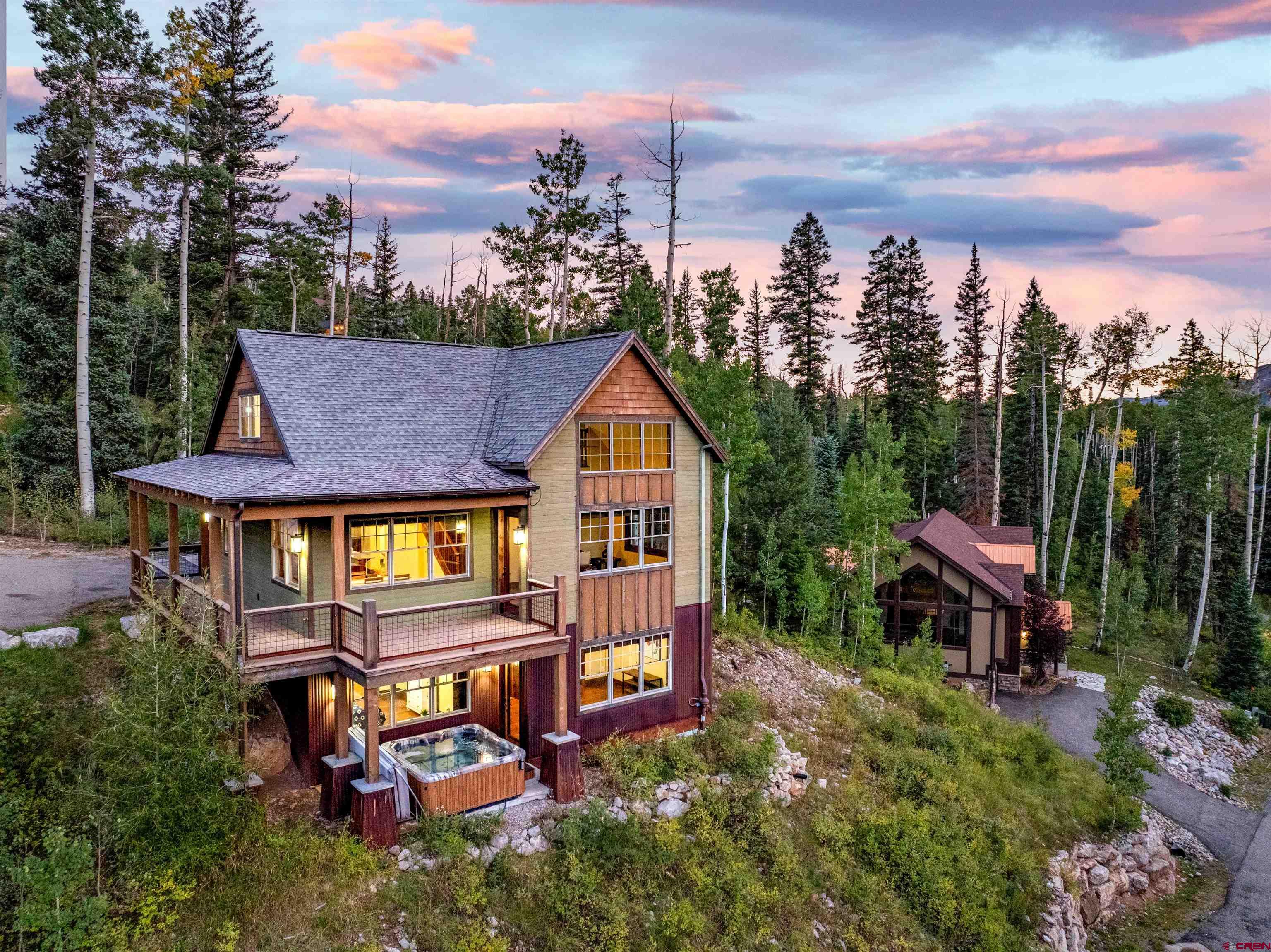 259 Engineer Drive Durango, CO 81301 - Photo 25 of 40 an aerial view of a house with swimming pool garden and trees