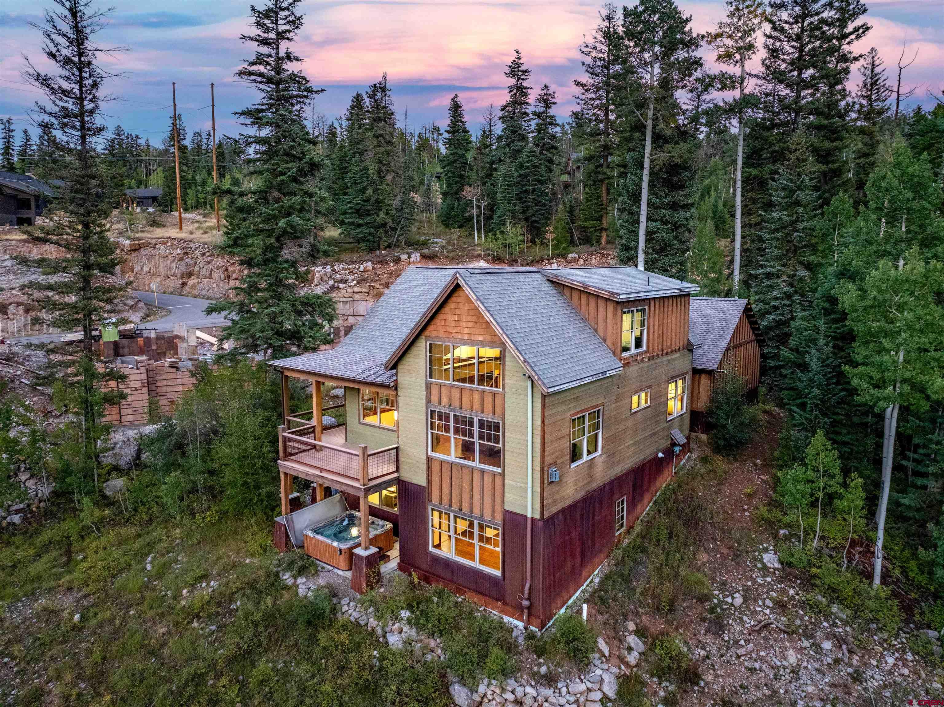 259 Engineer Drive Durango, CO 81301 - Photo 26 of 40 a view of a house with a big yard and large trees